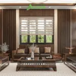 Cận cảnh bộ sofa gỗ óc chó nguyên khối cao cấp, vách gỗ lát dọc có đèn LED viền ẩn tạo chiều sâu, đèn tường đồng cổ điển đối xứng