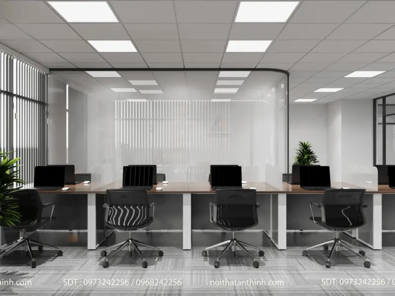 Khu làm việc chung – cụm bàn cluster mặt gỗ chân trắng, ghế lưới văn phòng đen, vách kính bo góc ngăn cách, cây xanh trang trí điểm xuyết
