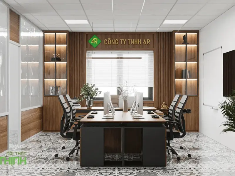 Phòng giám đốc – cụm bàn gỗ, logo công ty nổi bật, kệ gỗ LED, cây xanh, sàn gạch bông họa tiết cổ điển tạo nét hoài cổ ấm áp