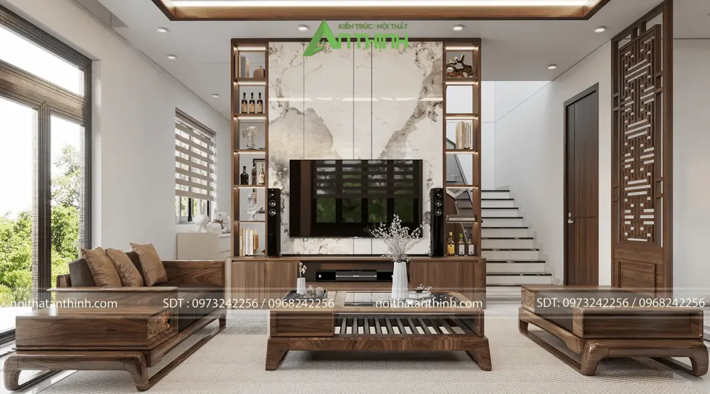 Tường tivi ốp đá marble trắng vân vàng làm điểm nhấn trung tâm, tủ trang trí có đèn spotlight hai bên, bộ sofa gỗ óc chó nệm da nâu