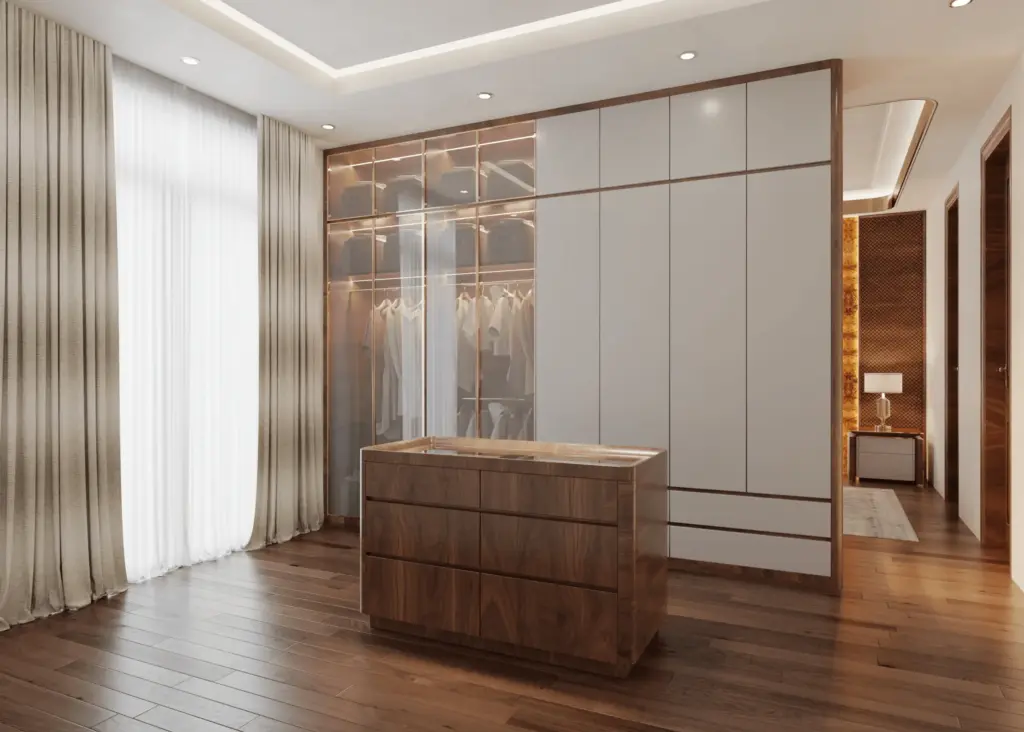 Walk-in closet – tủ quần áo kính khung vàng đồng có đèn LED nội thất, tủ trắng cao kịch trần, đảo giữa gỗ óc chó để phụ kiện